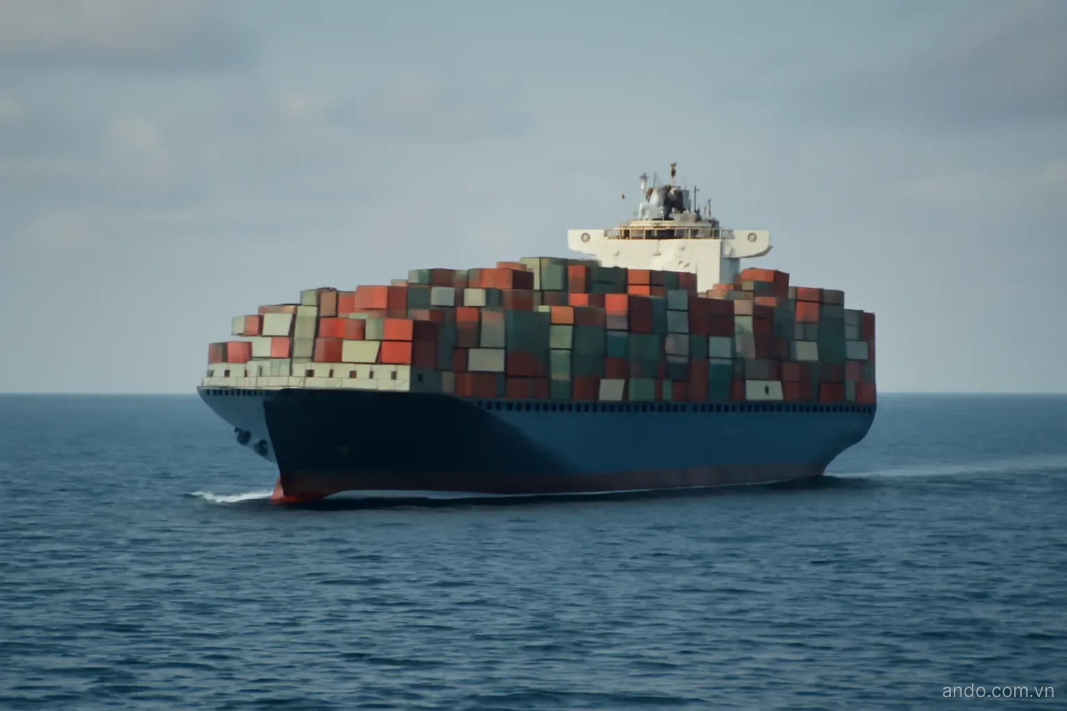 A cargo ship at sea seen from a distance with containers stacked high, wide view, no text